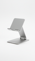 Display a steel tablet holder with a minimalistic design, no brand names, no text, no trademarks